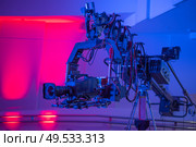 television crane. Shooting a TV show on the street. Стоковое фото, агентство Ingram Publishing / Фотобанк Лори