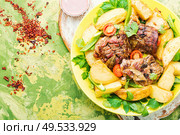 Danish meat baked with new potatoes.Roasted meat. Grilled meat and potatoes. Стоковое фото, агентство Ingram Publishing / Фотобанк Лори