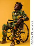 A man in a bright green and yellow suit is sitting in a wheelchair. Стоковое AI-изображение, AI-художник Данила Большаков / Фотобанк Лори