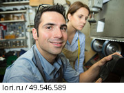 man cobbler looking at camera. Стоковое фото, агентство Ingram Publishing / Фотобанк Лори