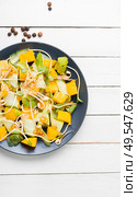 Vitamin spring salad with mango, cucumber, sprouts and mustard.Vegetarian dish,healthy food. Vegetable fruit salad with sprouts. Стоковое фото, агентство Ingram Publishing / Фотобанк Лори