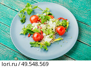 Dietary salad with sprouted green buckwheat, celery, tomato and microgreens.Fresh spring salad. Healthy vegetable salad. Стоковое фото, агентство Ingram Publishing / Фотобанк Лори