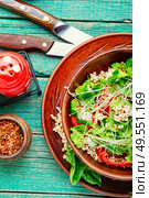 Dietary salad with sprouted green buckwheat, celery, tomato and microgreens.Bowl of vegetable salad. Healthy vegetable salad. Стоковое фото, агентство Ingram Publishing / Фотобанк Лори