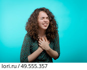 A woman with a heart attack. Стоковое фото, агентство Ingram Publishing / Фотобанк Лори