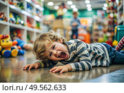 A little boy is lying on the floor in a store. Childish hysteria. The child screams, sobs, gets cranky and gets hysterical. Discontent. Стоковое AI-изображение, AI-художник Photojuli / Фотобанк Лори