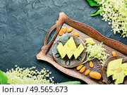 Sweet oriental halva dessert.Diet halva or halvah.Halva dessert of Turkey.. Oriental halva with nuts. Стоковое фото, агентство Ingram Publishing / Фотобанк Лори