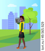 Smiling woman character walking with record player outdoor, african ethnic origin. Female holding sound equipment, girl going in urban park, Africa vector. African Female Walking with Radio in City Vector. Стоковая иллюстрация, агентство Ingram Publishing / Фотобанк Лори