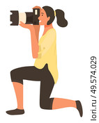 Woman paparazzi standing on one knee and making professional shoots on photo camera, profile view. Vector isolated photo correspondent with camera. Woman Paparazzi on Knee Making Professional Shoots. Стоковая иллюстрация, агентство Ingram Publishing / Фотобанк Лори