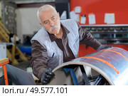 senior worker at a factory. Стоковое фото, агентство Ingram Publishing / Фотобанк Лори
