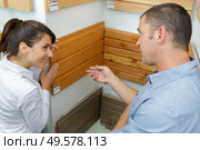 loving couple choosing kitchen fronts materials. Стоковое фото, агентство Ingram Publishing / Фотобанк Лори