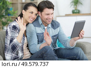 young attractive couple having online video chat. Стоковое фото, агентство Ingram Publishing / Фотобанк Лори