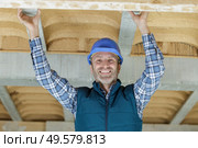 electrician man worker looking at camera. Стоковое фото, агентство Ingram Publishing / Фотобанк Лори