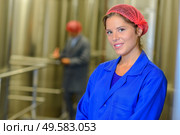 a female employee in warehouse. Стоковое фото, агентство Ingram Publishing / Фотобанк Лори