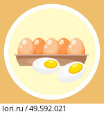 Hard boiled sliced egg with the yellow yolk and the white albumen in container isolated on yellow background. Chicken peeled boiled eggs organic food for good health. Source of vitamins and minerals. Hard boiled sliced egg with the yellow yolk isolated. Useful products when breastfeeding a child. Стоковая иллюстрация, агентство Ingram Publishing / Фотобанк Лори