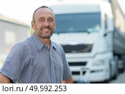 close up of a lorry truck driver smiling. Стоковое фото, агентство Ingram Publishing / Фотобанк Лори