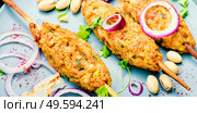 Minced meat skewers or lula kebab.Grilled lula kebab lamb. Arabic traditional kebab. Стоковое фото, агентство Ingram Publishing / Фотобанк Лори