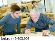 Woodwork apprenticeship. Стоковое фото, агентство Ingram Publishing / Фотобанк Лори