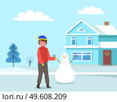 Kid walking in winter clothes outside. Happy boy in warm clothes standing against the background of a snowy house. Outdoor leisure activity. Male character on the street is sculpting a snowman. Child is walking in winter clothes outside. Happy young boy is making a snowman out of snow. Стоковая иллюстрация, агентство Ingram Publishing / Фотобанк Лори