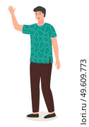 Chinese smiling young guy in green t-shirt and brown pants waves hello . Friendly and mysterious Asian man. Man waved a hand. Commonwealth, racial differences. Communication culture. Flat image. Chinese young guy waved a hand. Friendly man of Asian nationality. Flat vector illustration. Стоковая иллюстрация, агентство Ingram Publishing / Фотобанк Лори