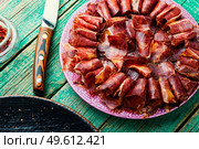 Sliced basturma or beef jerky.Horse meat jerky.Armenian cuisine. Sliced basturma or jerky. Стоковое фото, агентство Ingram Publishing / Фотобанк Лори