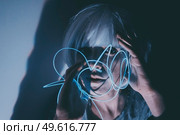 Weird dystopian theme portrait with blue neon lights. Стоковое фото, агентство Ingram Publishing / Фотобанк Лори