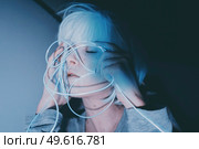 Weird dystopian theme portrait with blue neon lights. Стоковое фото, агентство Ingram Publishing / Фотобанк Лори