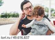 Father and daughter spending good time together in summer vacation. Стоковое фото, агентство Ingram Publishing / Фотобанк Лори
