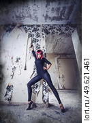 girl model in black with pink hair in an abandoned building. Стоковое фото, агентство Ingram Publishing / Фотобанк Лори