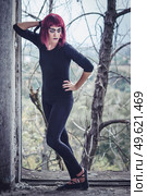 girl model in black with pink hair in an abandoned building. Стоковое фото, агентство Ingram Publishing / Фотобанк Лори