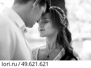 guy and a girl walk along the paths of a forest park between tall trees. Стоковое фото, агентство Ingram Publishing / Фотобанк Лори
