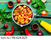 Meat sauce with mushrooms, zucchini, tomato and potatoes. Homemade stew meat in stewpot. Ragout with meat and vegetables. Стоковое фото, агентство Ingram Publishing / Фотобанк Лори