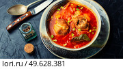 Borscht - hot soup based on beets and meat. Red borscht, traditional dish of Ukrainian cuisine. Red borscht, main first course. Стоковое фото, агентство Ingram Publishing / Фотобанк Лори