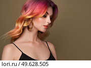 Beauty Fashion Model Woman with Colorful Dyed Hair. Girl with Perfect Makeup and Hairstyle. Model with Perfect Healthy Dyed Hair. Care and Beauty Hair Products. Стоковое фото, агентство Ingram Publishing / Фотобанк Лори