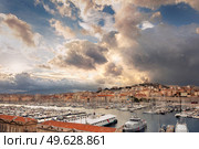 Aerial panoramic view on basilica of Notre Dame de la Garde and old port in Marseille, France. panoramic view on basilica of Notre Dame de la Garde and old port in Marseille, France. Стоковое фото, агентство Ingram Publishing / Фотобанк Лори
