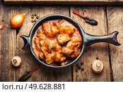 Fried meat with mushrooms, beef stroganoff from pork. Russian cuisine. Beef stroganoff with mushrooms in a creamy sauce. Стоковое фото, агентство Ingram Publishing / Фотобанк Лори