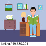 A man or boy sits in armchair and reads book, bedside table lamp, cupboard with books, paintings, shelf with books, photo on the wall in the living room. Cozy home interior. Flat vector illustration. Man sitting in armchair and reading a book. Living room interior furniture. Flat vector image. Стоковая иллюстрация, агентство Ingram Publishing / Фотобанк Лори
