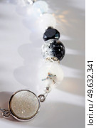 jewel handmade bracelet with semipreciouse stones at white  background. Стоковое фото, агентство Ingram Publishing / Фотобанк Лори
