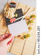 Fushion food of modern california roll and gyoza. Стоковое фото, агентство Ingram Publishing / Фотобанк Лори