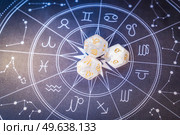 Horoscope zodiac circle with divination dice, top view. Fortune telling and astrology predictions concept, magic rituals and exoteric experience. Zodiac horoscope with divination dice. Стоковое фото, агентство Ingram Publishing / Фотобанк Лори