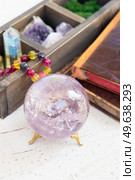Gemstones set for relax and meditation. Magic ball made of Amestist and minerals for Reiki life balance, healing Crystal Ritual, Witchcraft, spiritual esoteric practice.. Healing crystals concept. Стоковое фото, агентство Ingram Publishing / Фотобанк Лори