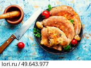 Closed pizza with mushrooms. Calzone - Italian pie. Calzone - Italian pie, pizza. Стоковое фото, агентство Ingram Publishing / Фотобанк Лори