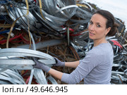 female worker at a scrap metals. Стоковое фото, агентство Ingram Publishing / Фотобанк Лори
