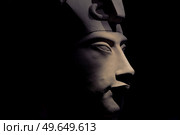 bust of pharaoh Echnaton (Akhenaten, aka Amenhotep IV) around black background . cloes up. Стоковое фото, агентство Ingram Publishing / Фотобанк Лори