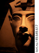 bust of pharaoh Echnaton (Akhenaten, aka Amenhotep IV) around black background . cloes up. Стоковое фото, агентство Ingram Publishing / Фотобанк Лори
