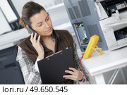 checking voltage of a device. Стоковое фото, агентство Ingram Publishing / Фотобанк Лори