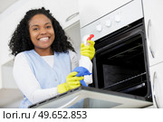 young female housekeeper loving her job. Стоковое фото, агентство Ingram Publishing / Фотобанк Лори