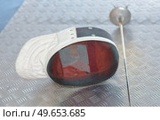 close up of fencing visor and foil. Стоковое фото, агентство Ingram Publishing / Фотобанк Лори