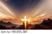 Shining cross in sun ray, Ascension day concept, Christian Easter celebration, Faith in Jesus Christ and Christianity.. Ascension day concept, Christian Easter. Стоковое фото, агентство Ingram Publishing / Фотобанк Лори