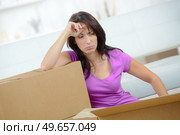a sad homeowner moving homes. Стоковое фото, агентство Ingram Publishing / Фотобанк Лори