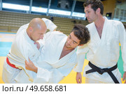 passing to the next belt. Стоковое фото, агентство Ingram Publishing / Фотобанк Лори